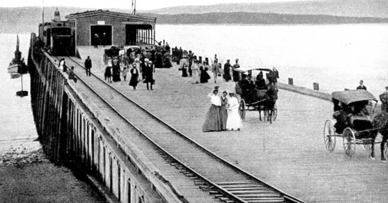 people walking along the warf