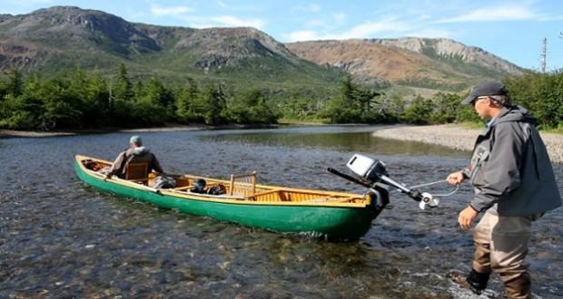 Image of a man with a small speed boat